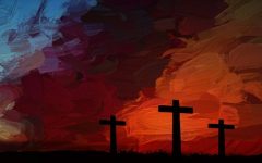 Three crosses against a dark sky